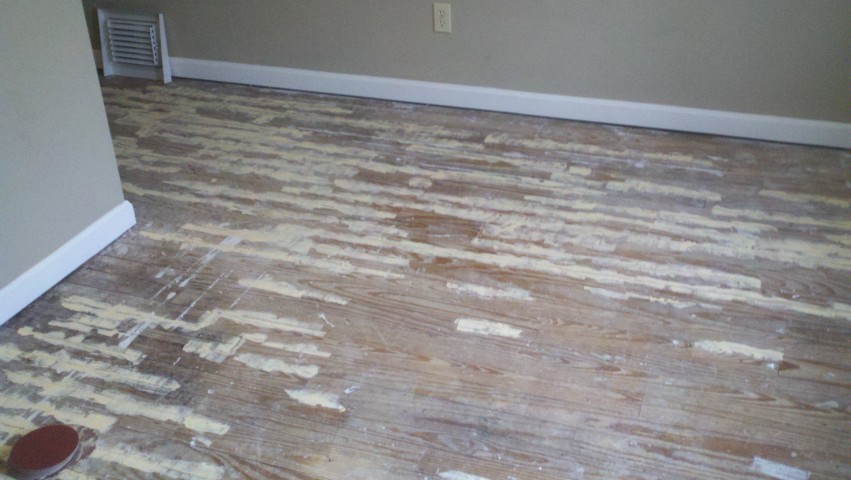 Severely damaged hardwood flooring